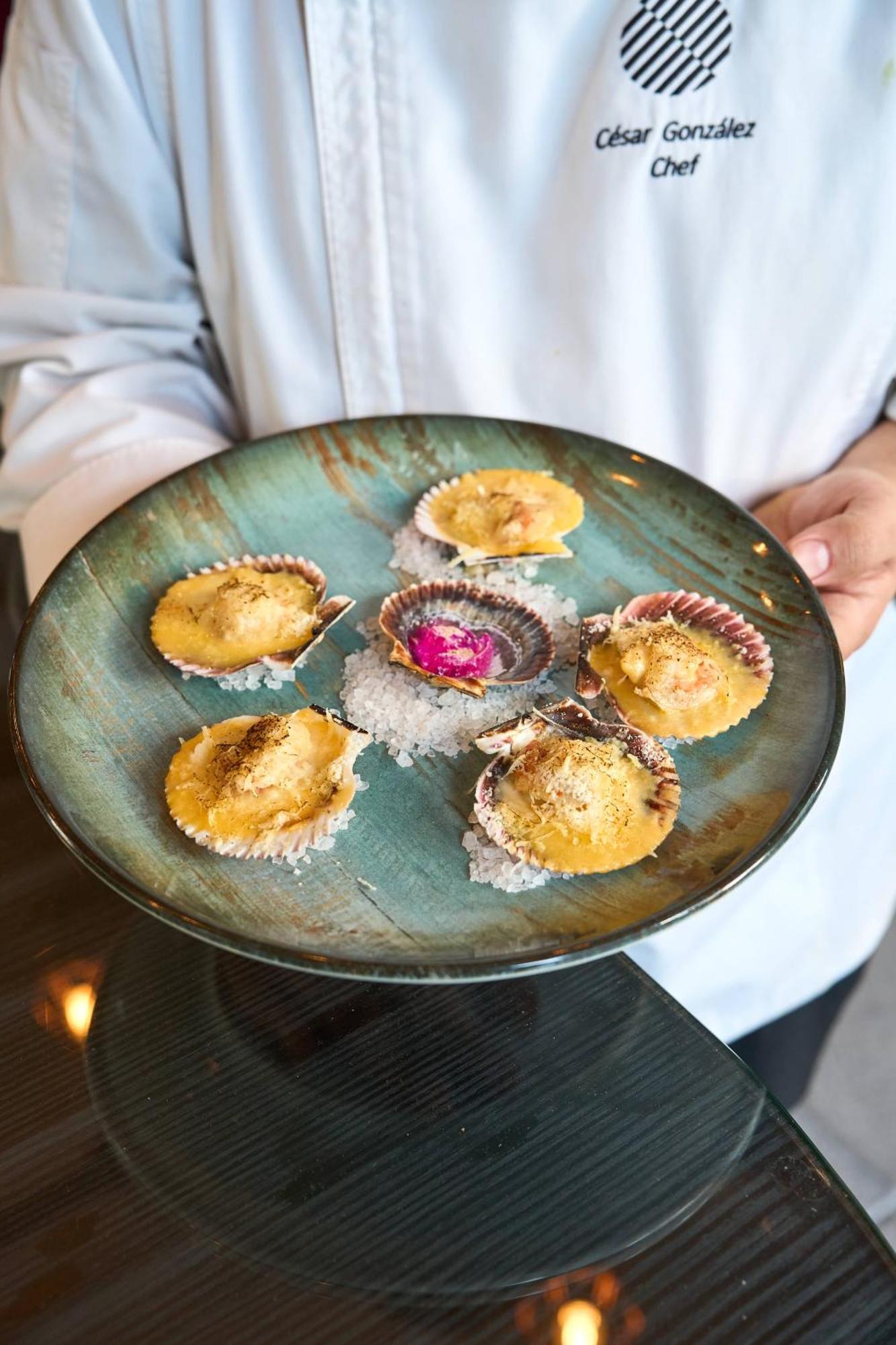Pullman Santiago Vitacura Exterior photo A plate of cooked scallops