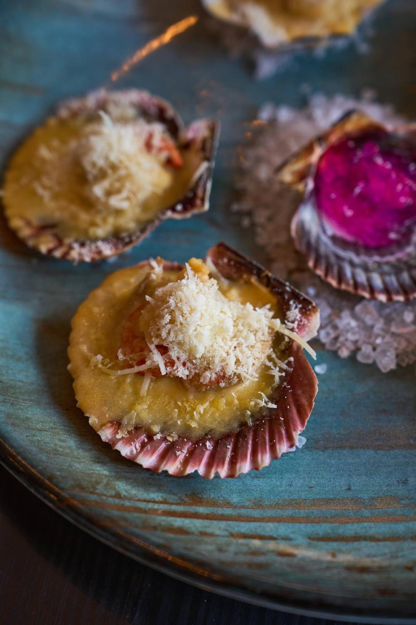 Pullman Santiago Vitacura Exterior photo A baked scallop