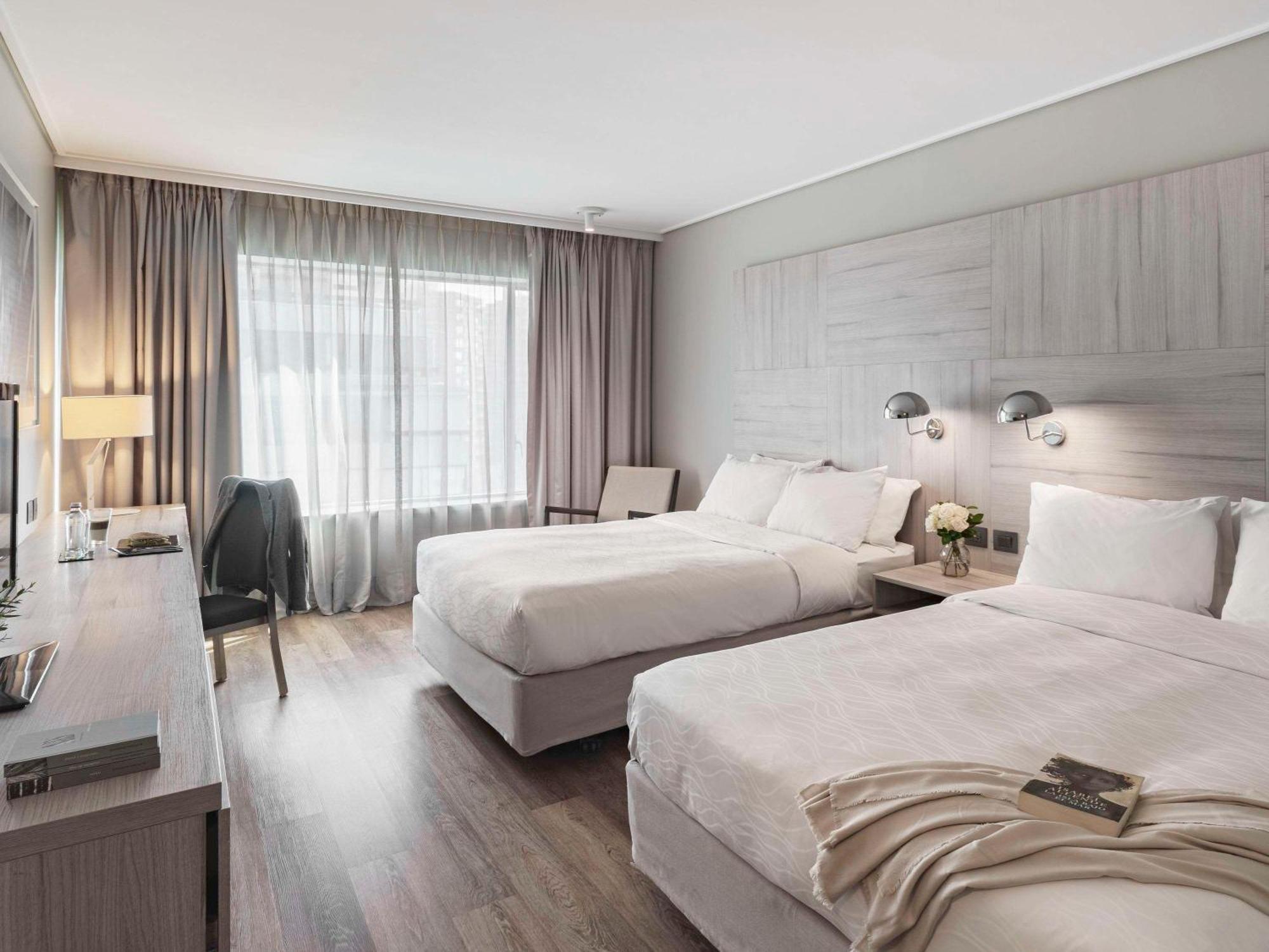 Pullman Santiago Vitacura Exterior photo A typical room at the hotel